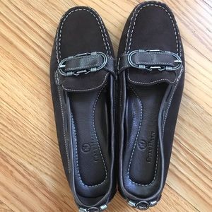 Brown moccasin-like Cole Haan loafers